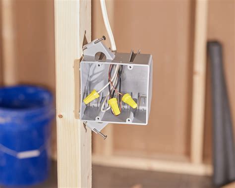 attaching metal outlet box to wooden stud